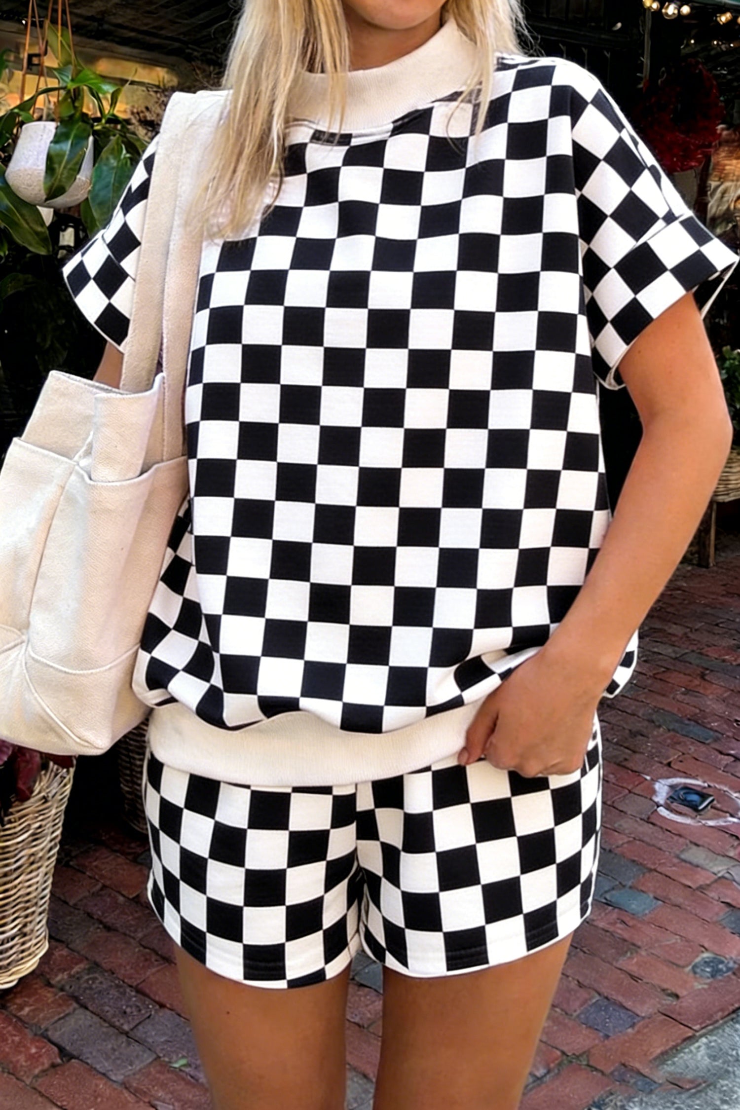 Short femme à carreaux, col montant, colorblock — noir