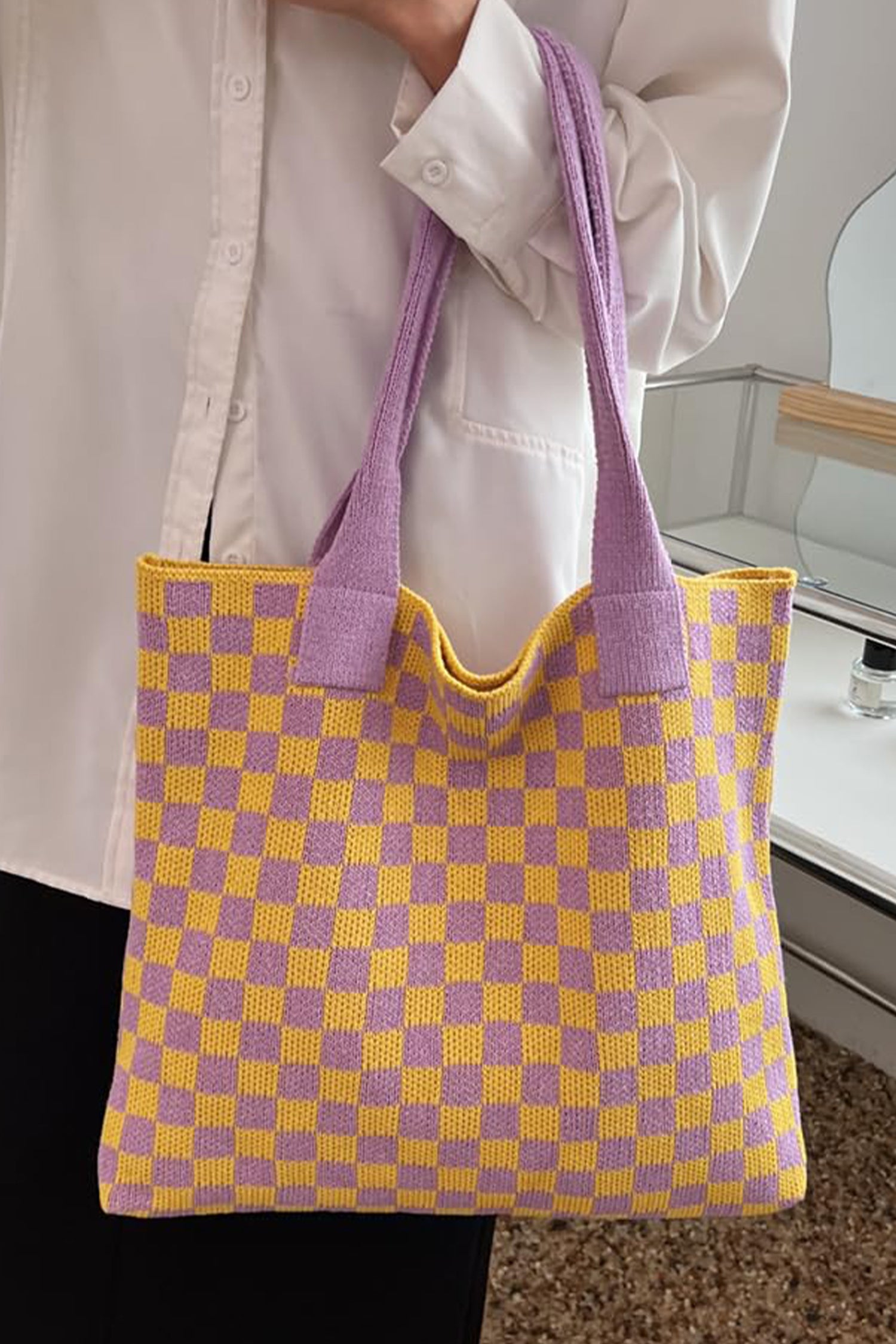 Pièce mode femme à carreaux, en maille